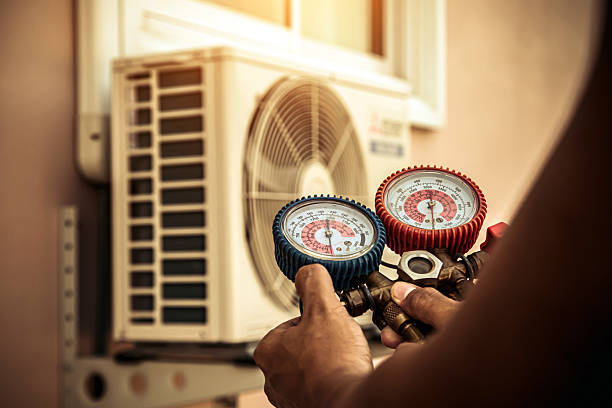 Professional Air Conditioning Service technician working in King George, VA